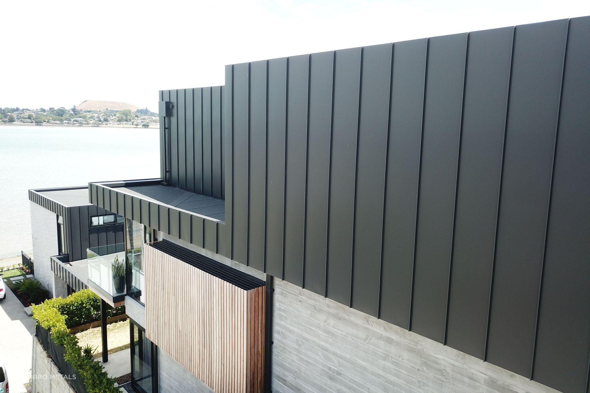 Options like this Ultra Matte Grey Black Premium Pre-Coated Aluminium solution from Ambro Metals has a great lifespan with little maintenance required.
