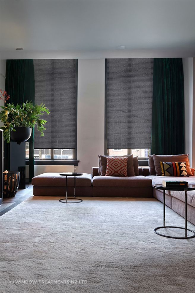 Heavy lined curtains provide excellent insulation benefits, particularly when floor-length and properly fitted.