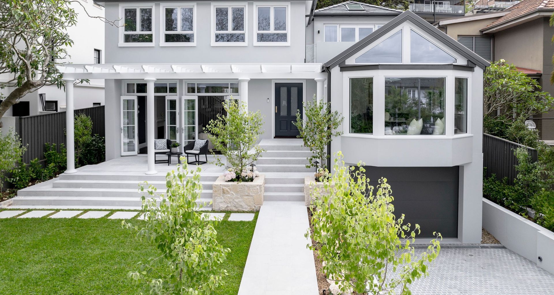 Luna Chiaro Limestone | Silhouette Grey Granite Cobblestones | HecticrAt architects | McRae + Lynch | Tass Construction Group