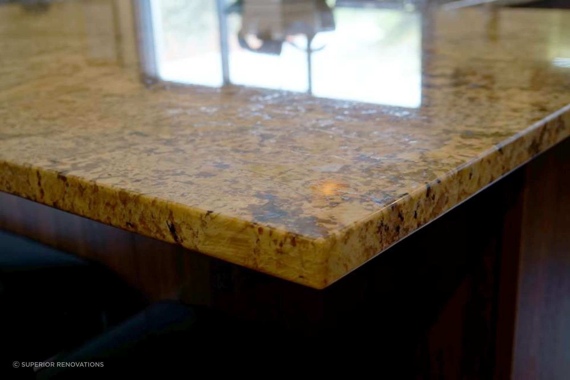 Kitchen renovation in Stanmore Bay: Engineered stone used to look like pattered granite. The pattern chosen by our client was Autumn Leaf. 