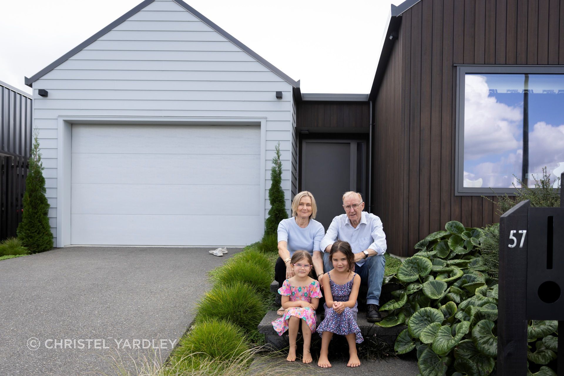 Family-outside-front-of-house-v3.jpg
