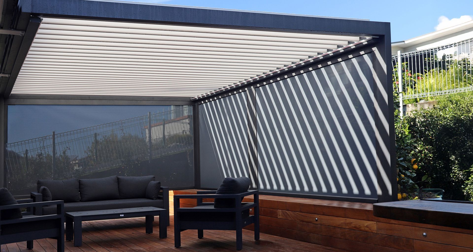 Louvre Roof and motorised Securo Exterior Blinds - climate and privacy control.