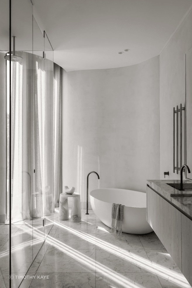 Opulent materials that are both striking and balanced in the way they sit in various rooms are featured in the space.