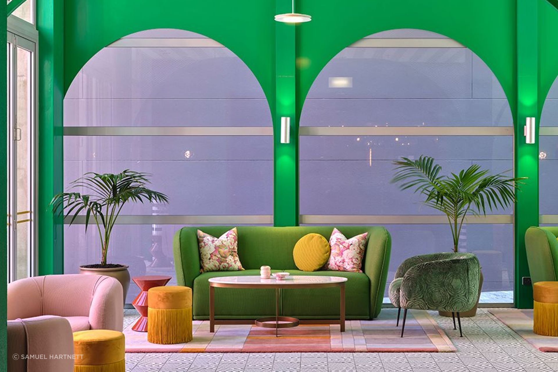 The fresh look of the parlour. Covid-19 caused product supply issues, which meant much tweaking to the mix of colours and materials. The fringed poufs are by Houtique and the green chair is covered in Mokum Water Lily fabric from James Dunlop Textiles.