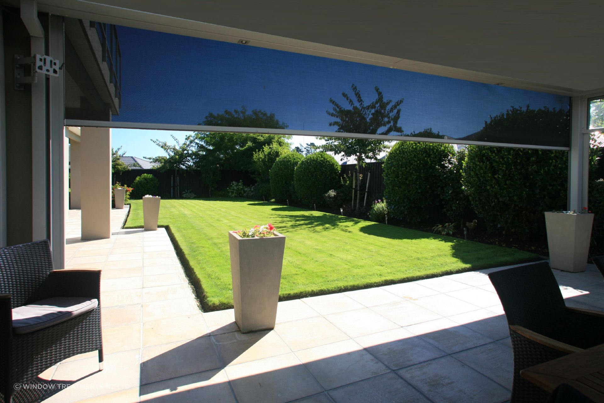 Louvre Roof and motorised Securo Max exterior blind.
