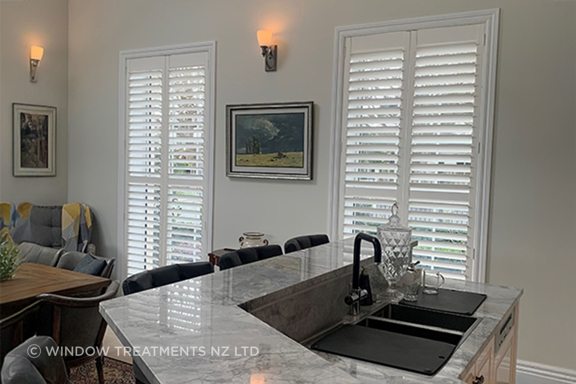 Shutters' solid timber construction and close fit to the window help create an insulating barrier