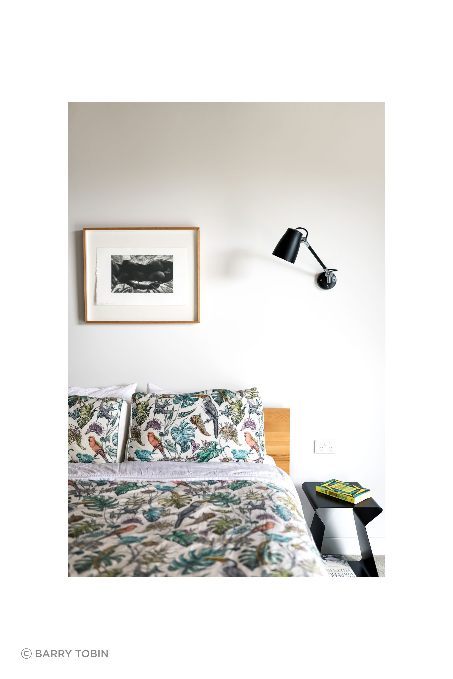 The house has four bedrooms, two bathrooms and a powder room. The walls are painted in Resene Snowdrift, which is offset by all steel being painted in Resene Nero.
