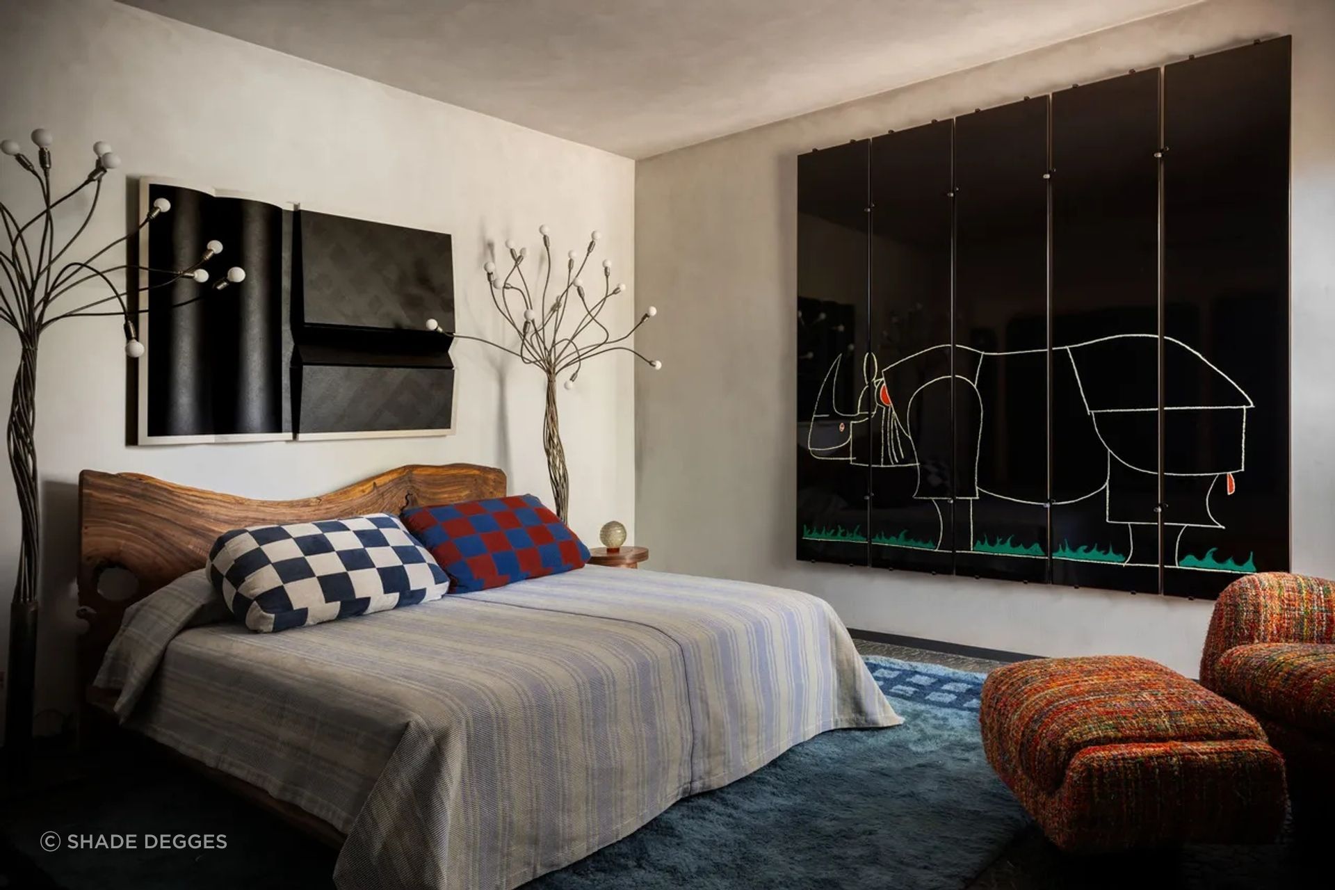 Enzo Catellani floor lamps flank a painting by Robert Moreland in a guest room; artwork (at right) by François-Xavier Lalanne. Art: Robert Moreland. François-Xavier Lalanne.