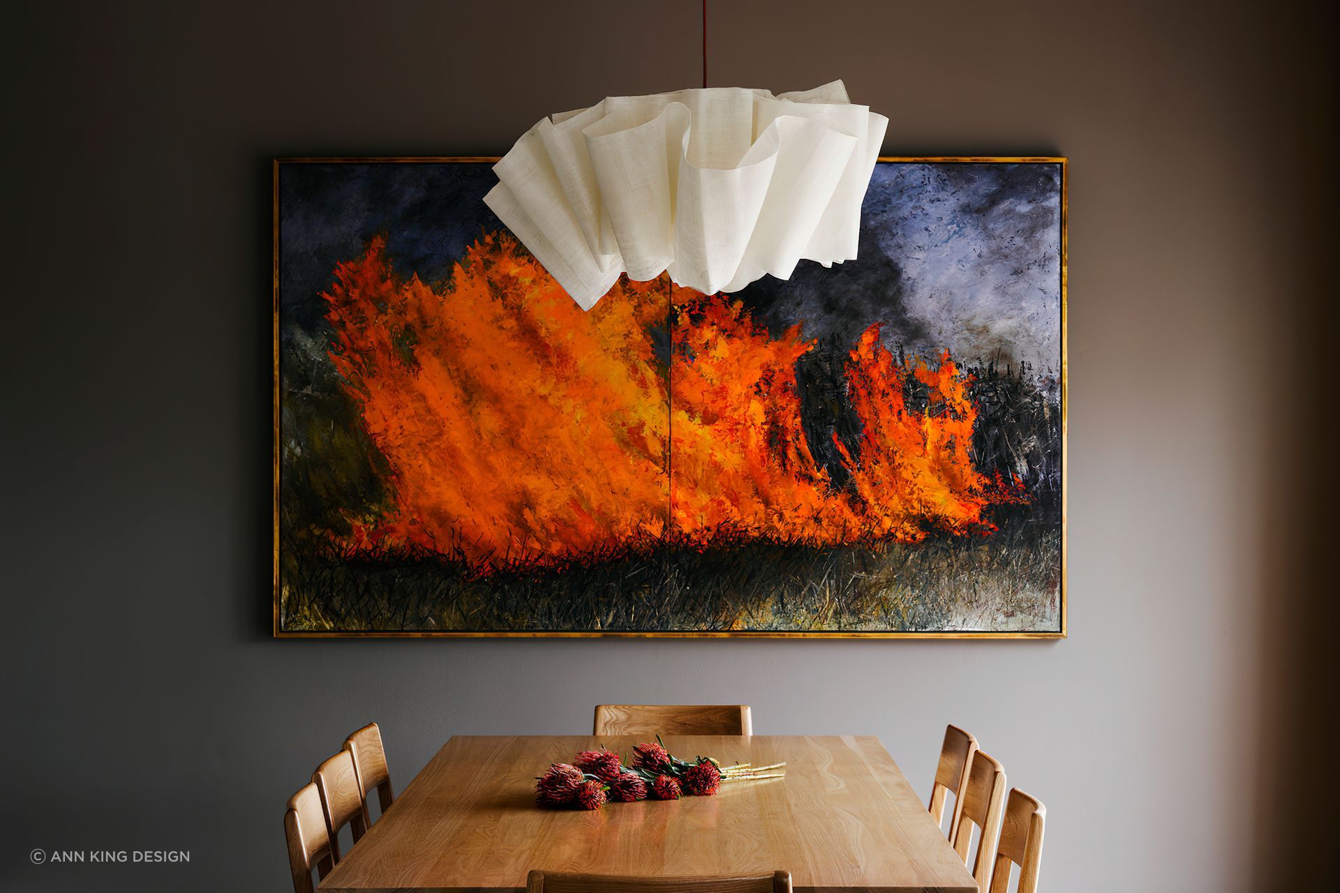 Striking wall art can brath life and emotion into a dining room.