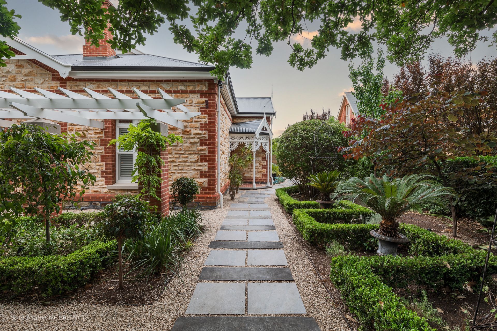 Front yard landscaping design can be centred around pots and plants
