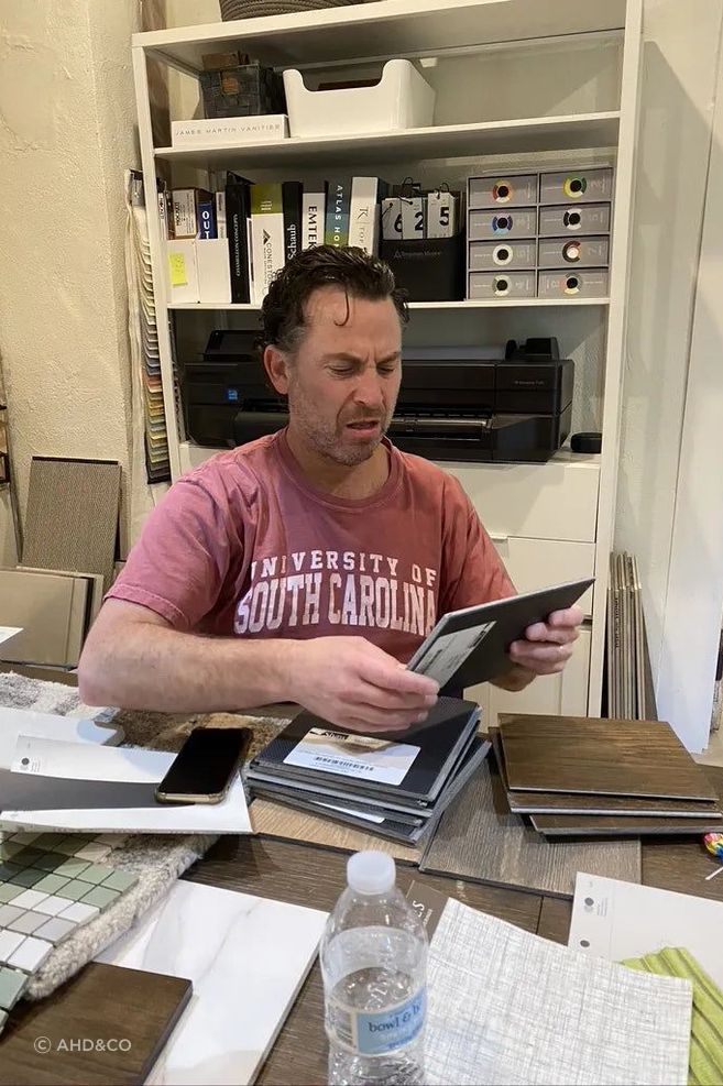 My husband, Robert, helping review budget necessities (and indulgences).