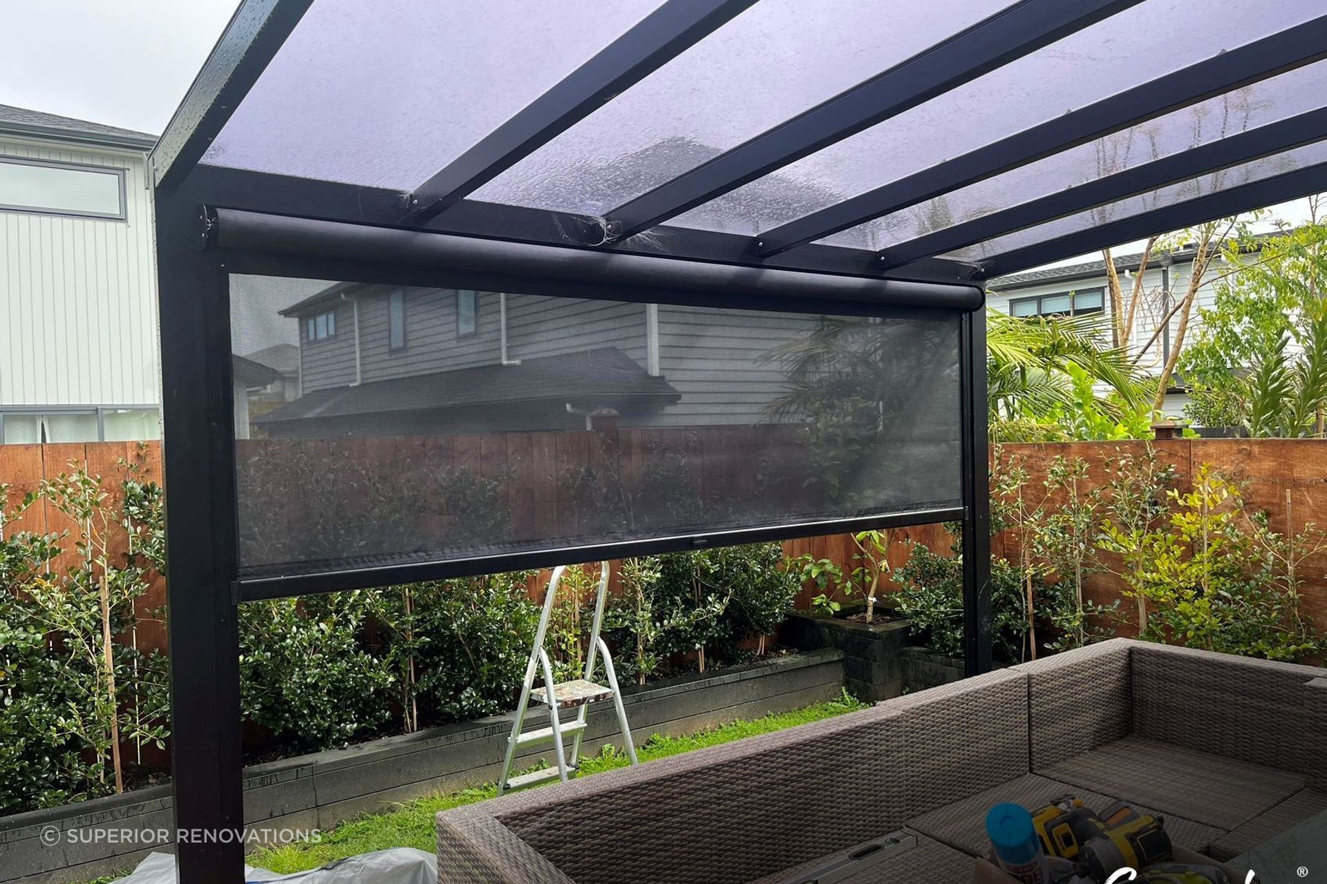A pergola that acts as a family living space protecting them from outside elements like rain