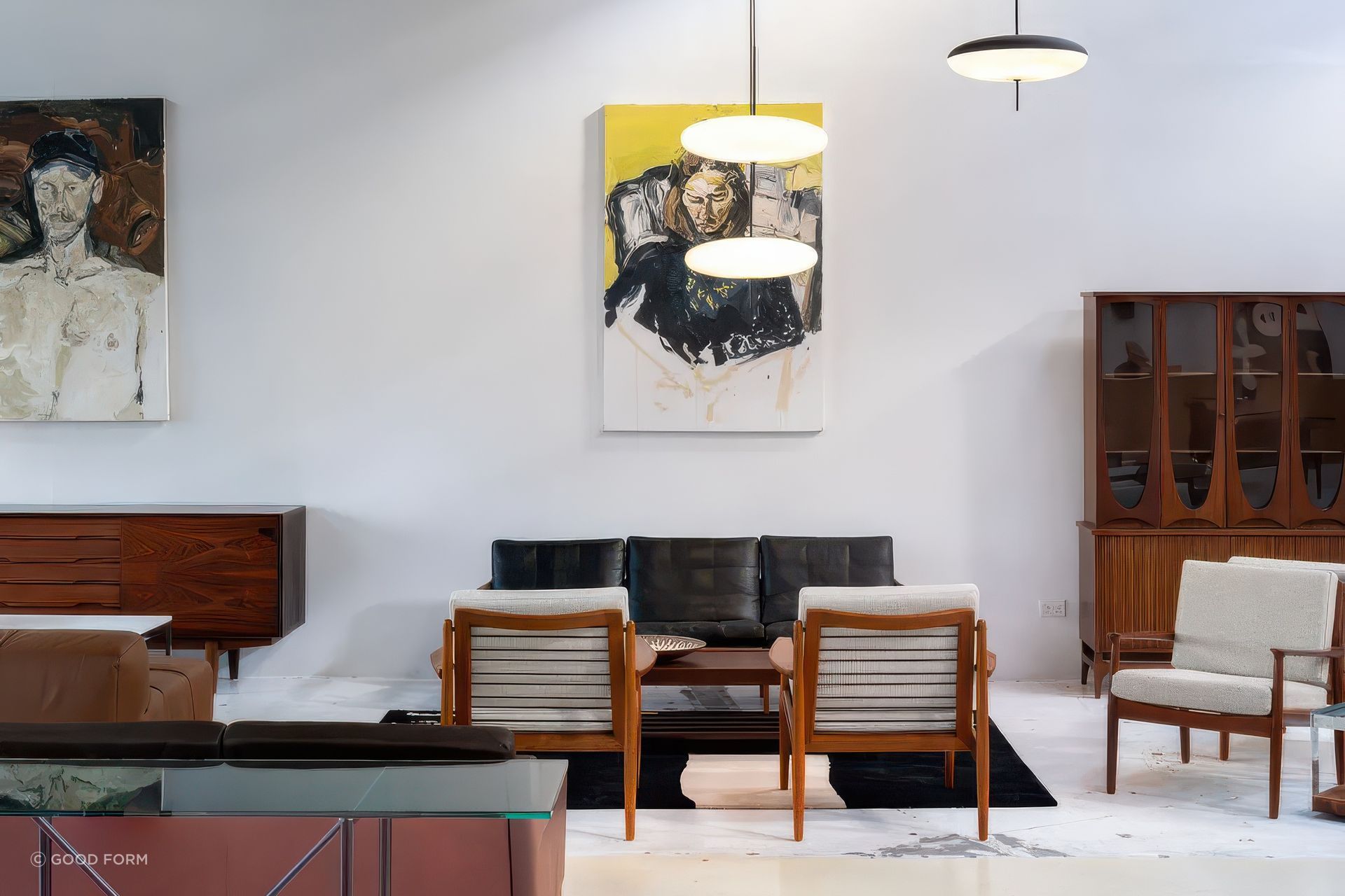 Vintage lounge pieces sit comfortably together with the 2065 Pendant Lamp from Astep and the Vienna Console from OMK.