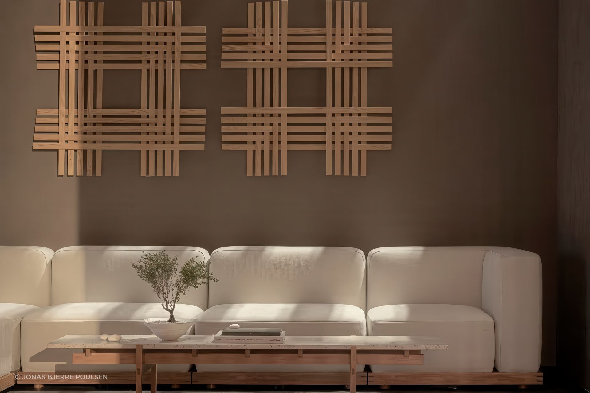 N-S02 Modular Sofa and N-CT01 Coffee Table paired with a contemporary wall sculpture by Sara Martinsen – please enquire for details.