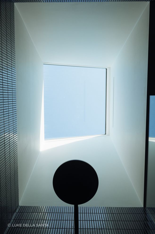 Shadowline Diffuser Pro is installed discreetly in the bathroom skylight at Ember.