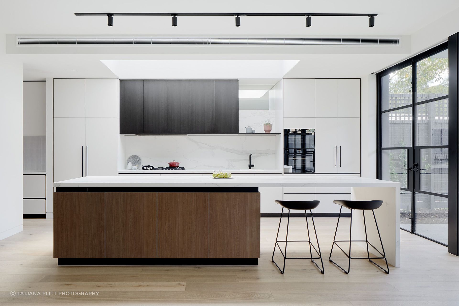"The kitchen was really important; it was probably the most important room in the house for the client. They wanted it to be generous, light-filled, have lots of storage, and be a robust, working kitchen because they love to cook."