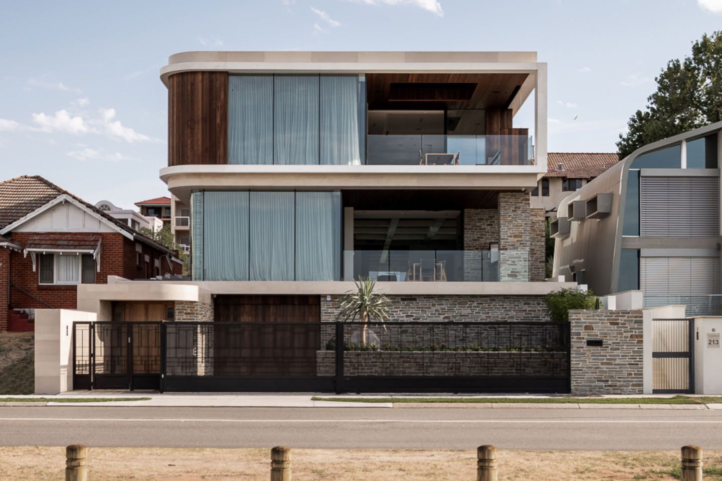 The Art Deco curves of the street-facing elevation reflect the Art Deco inspiration behind the design.