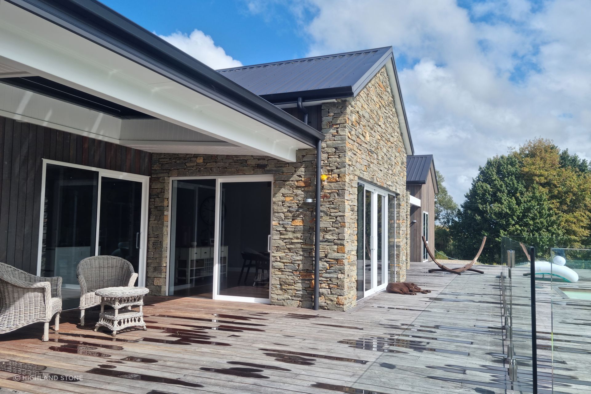 Cluden schist, the stone used at Aspin Road, is a metamorphic rock found in the Southern Alps of New Zealand. Favoured for its striking dark green colour and gorgeous natural orange and yellow flecks, the stone captures that rustic farmhouse feel popular with rural homeowners and architects alike.