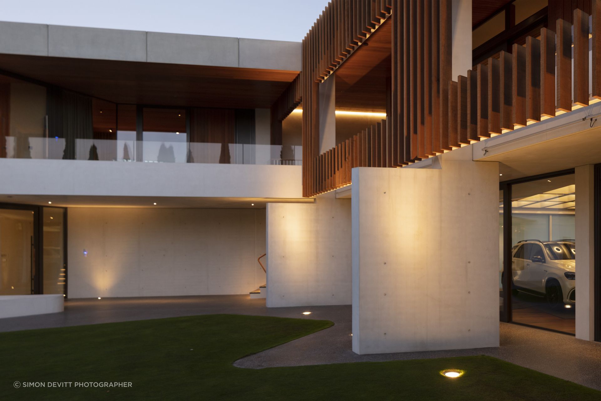 The courtyard displays the elements of the building's design – concrete, cedar and curvaceous forms.