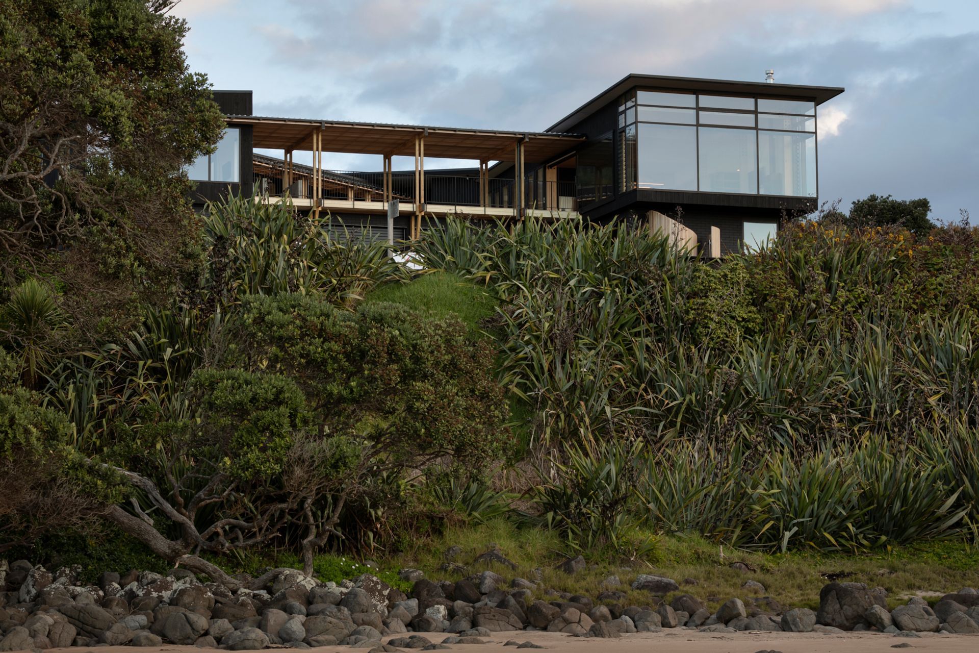 The house has five bedrooms, two bathrooms and two powder rooms. The build was by Hot Water Beach Design and Construction and uses mainly Accoya timber.