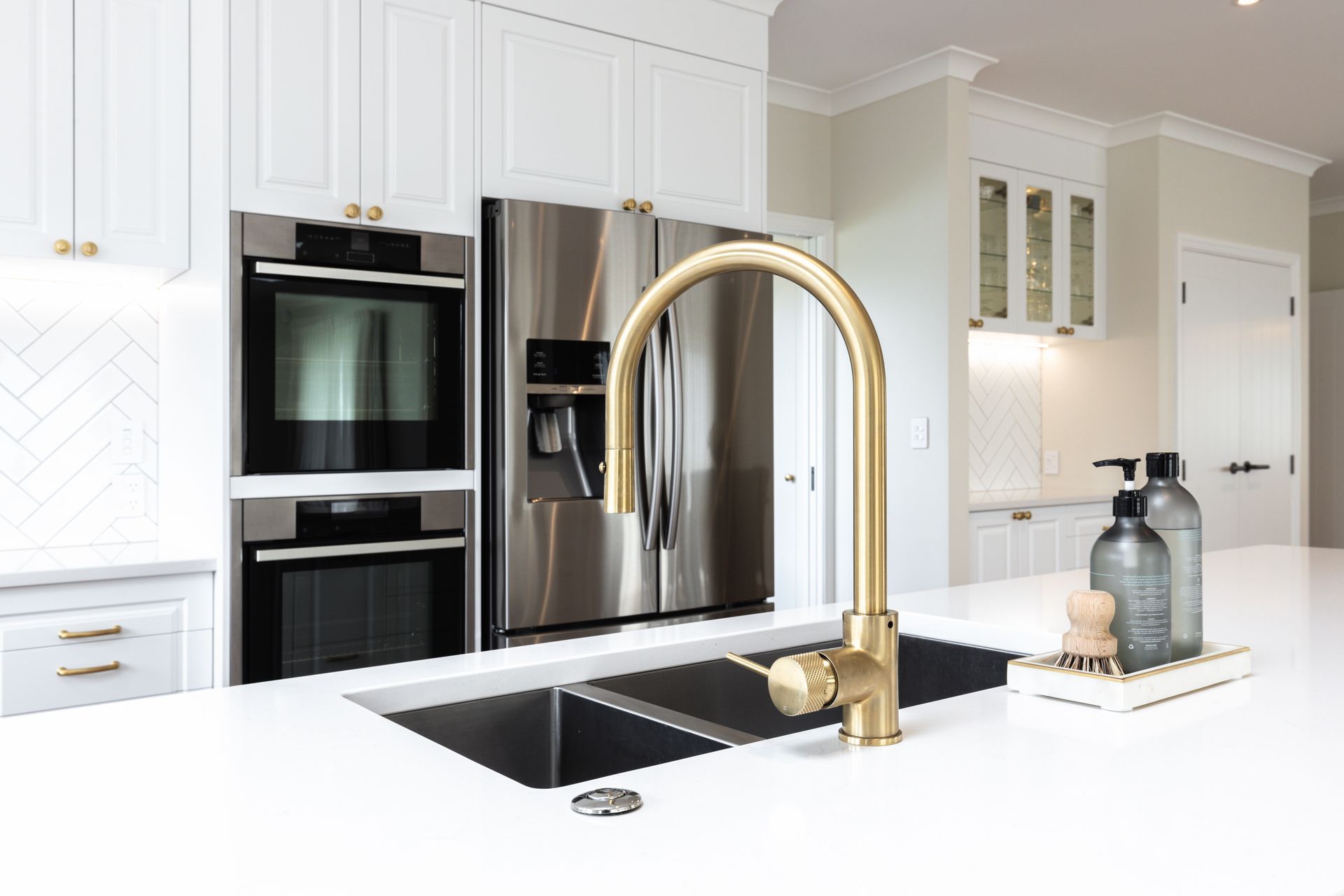 Brass hardware features throughout.