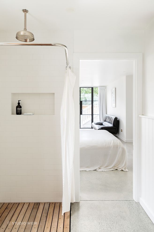 Construction included clearing under the house to create a guest bedroom, ensuite and laundry.