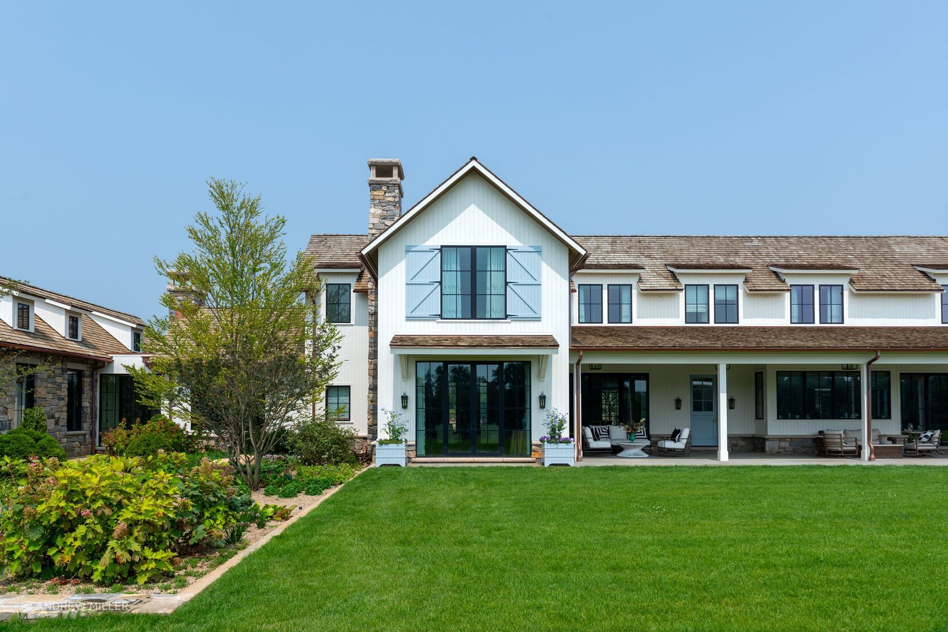 The exterior of the countryside estate on a farm in the hills of the Midwest.
