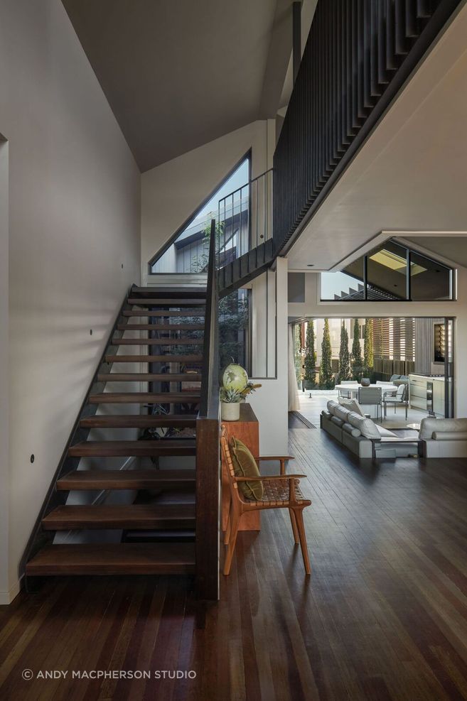 Vertical connectivity is achieved both visually and physically via the open riser stair and central atrium allowing an unobstructed line of sight between the living area and loft, making the space feel more expansive.