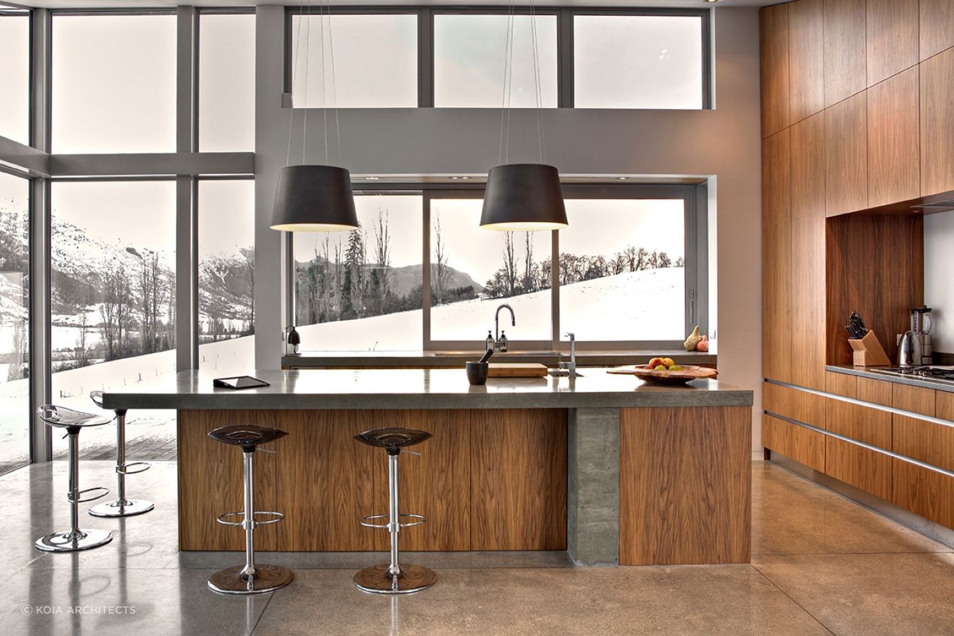 A perfectly balanced use of cedar, stone and concrete feature throughout the home.