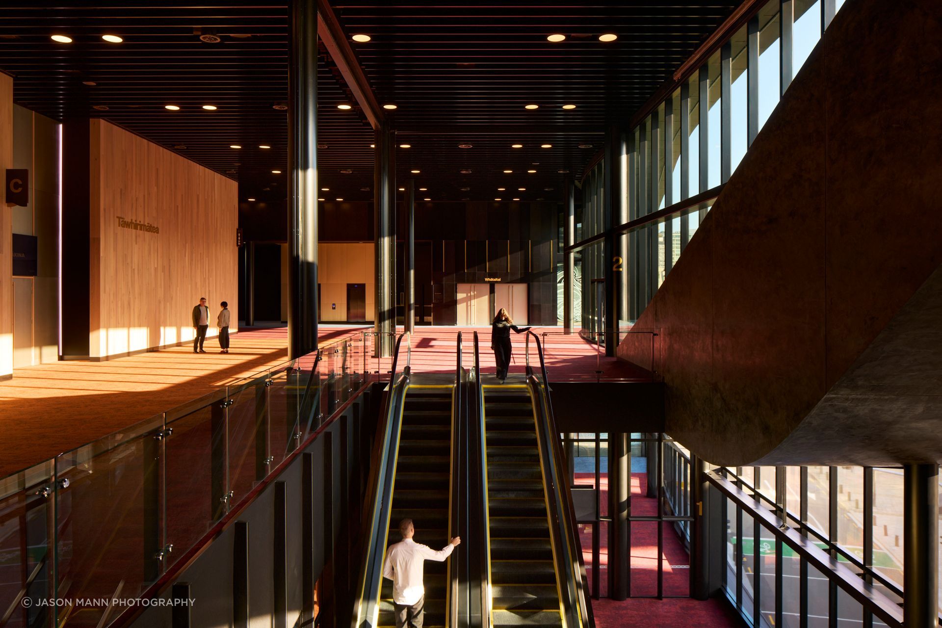 The escalator landing at level two, Tākina's top floor.