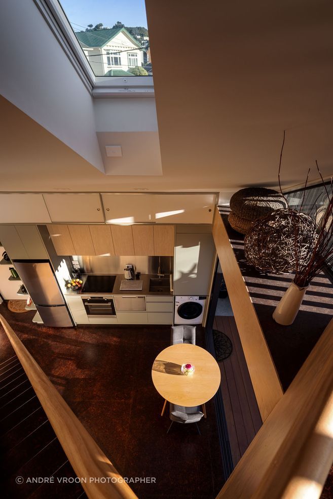 The mezzanine floor is a clever bonus space that allows room for a guest to stay and a spot to use as a study.