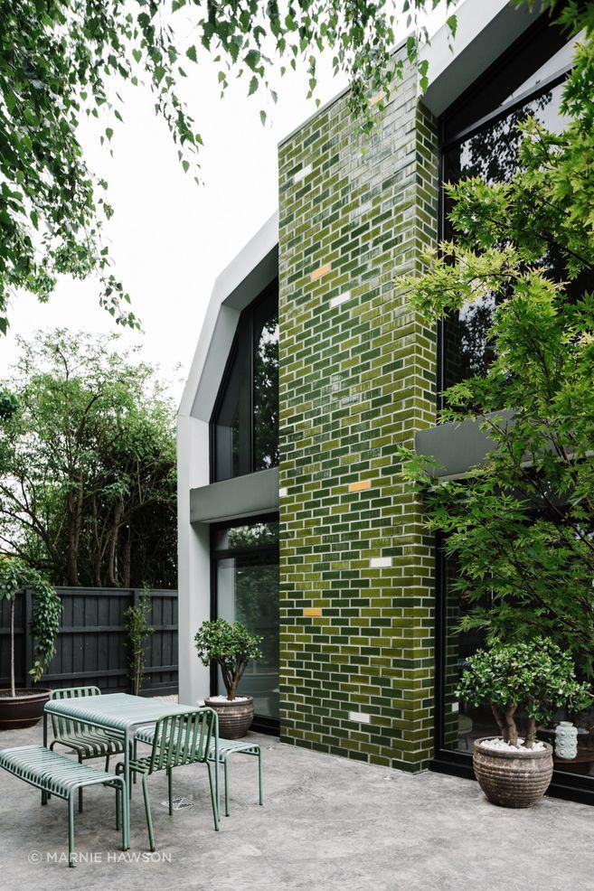 The glazed handmade brick tiles channel the Australian bush.