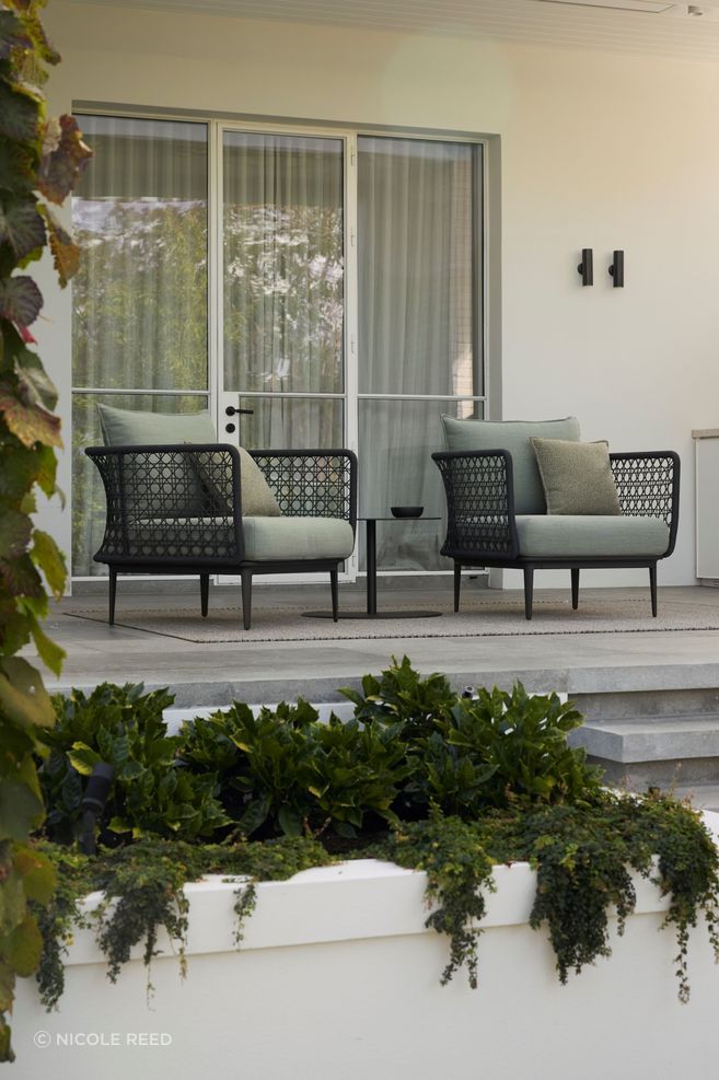 Kett's Aireys outdoor chairs feature woven details on the arms and offer exceptional comfort.