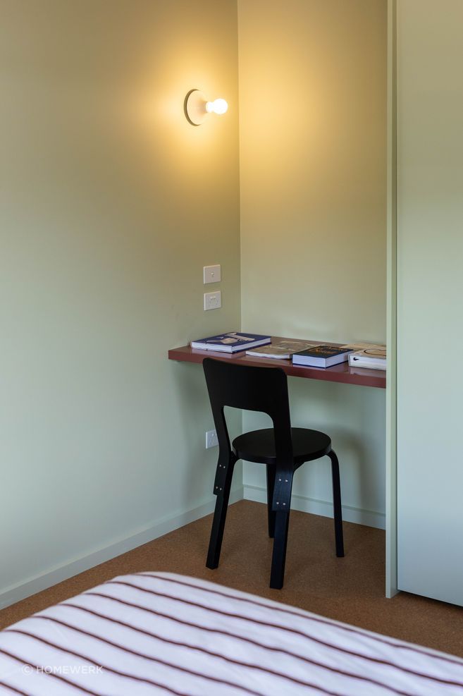 The primary bedrooms in Cabin Originale and Cabin Double feature a built-in desk.