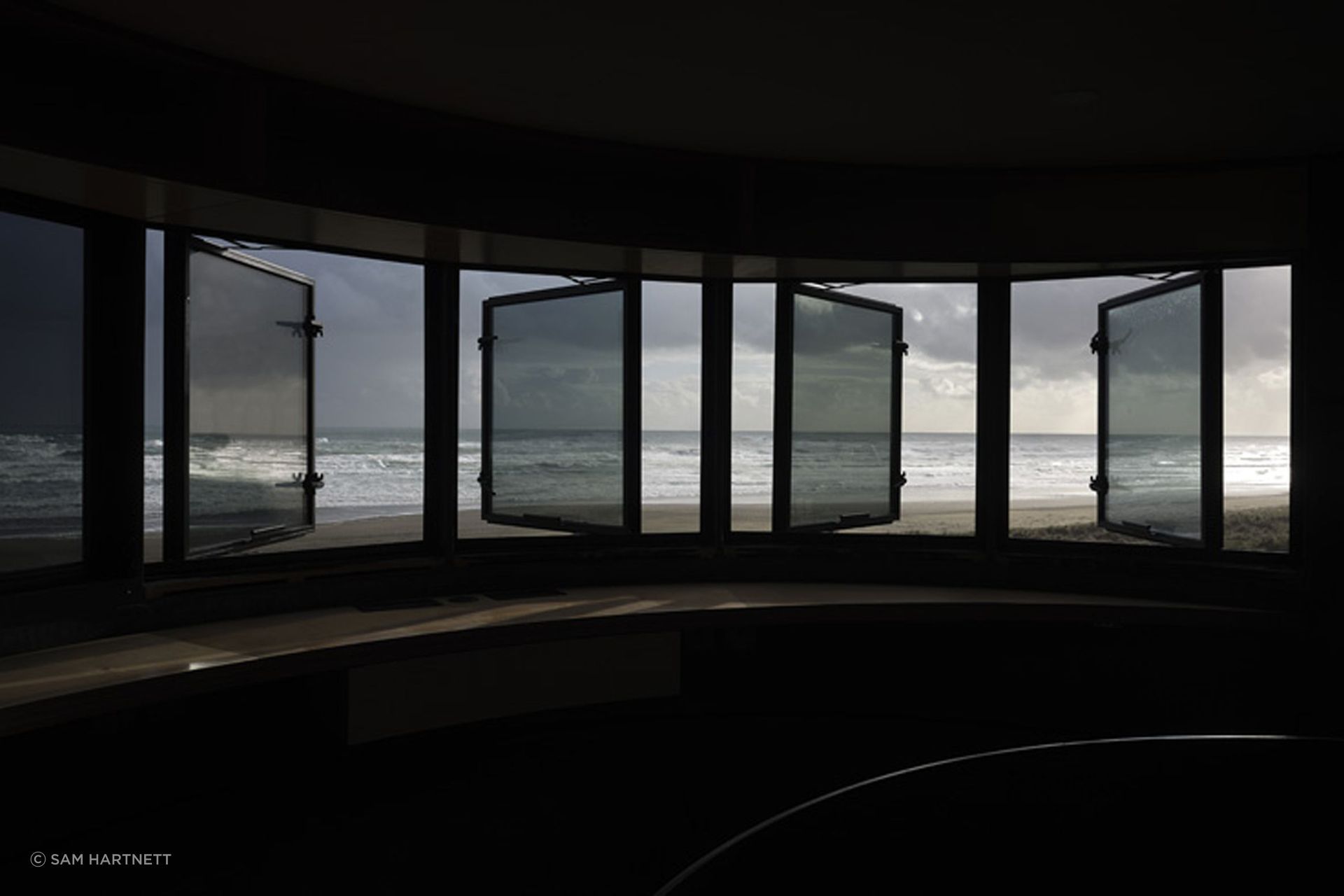 The tower's operable windows, providing protection from the coastal winds.