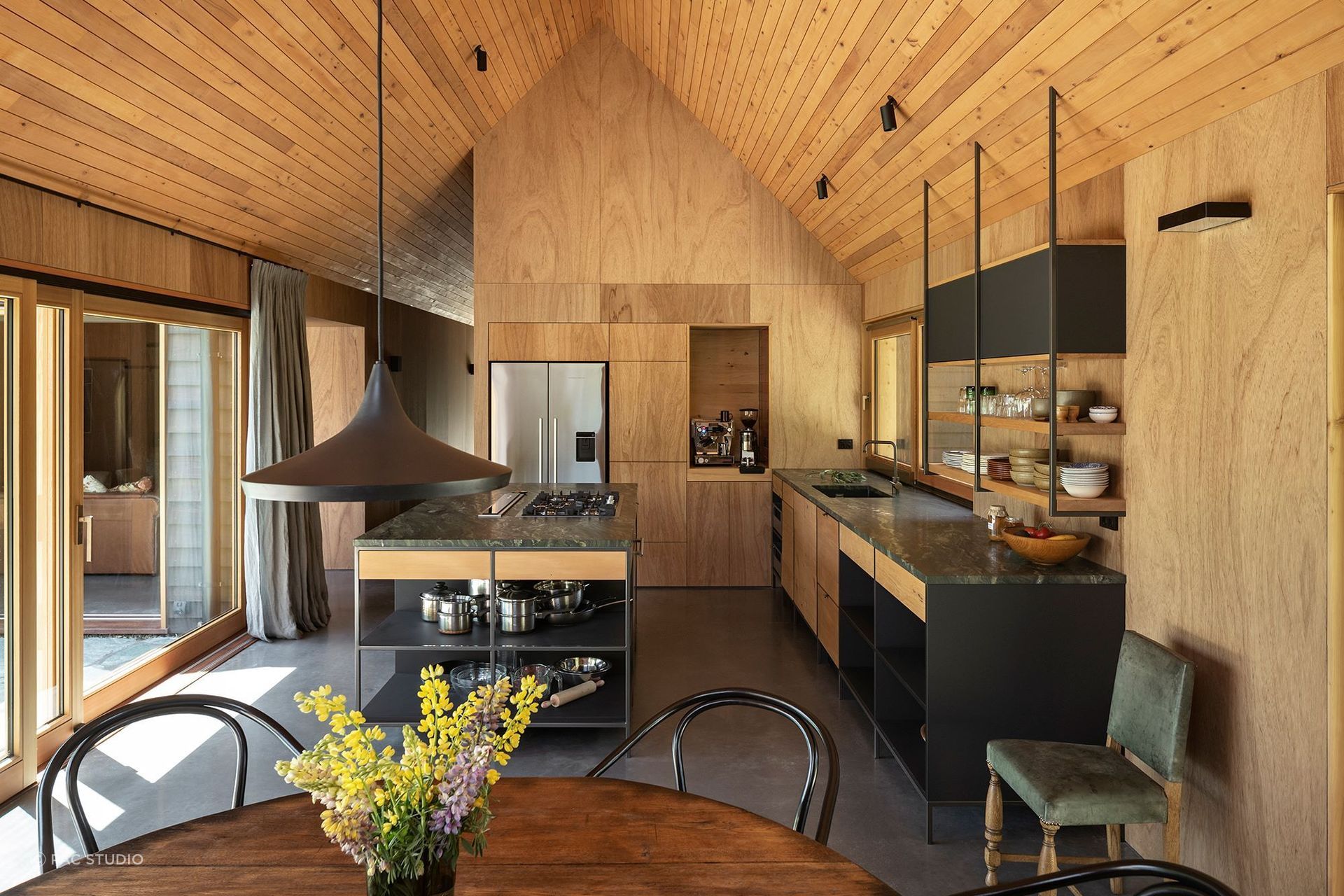 Timber panelling and finishes are ever-present throughout the homely interior. | Photography: Simon Devitt