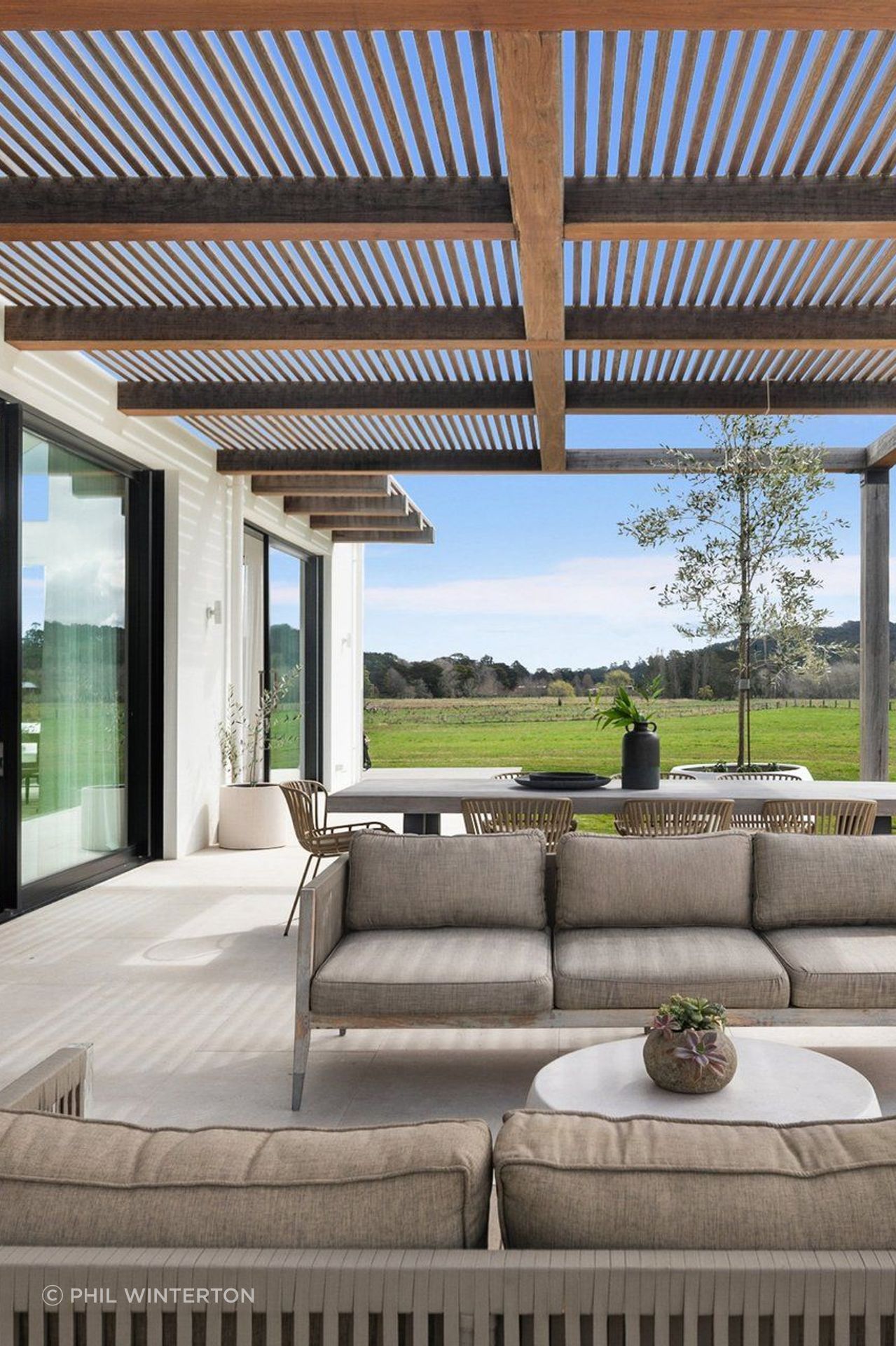 Deconstructing the house with pavilions to connect with the landscape.