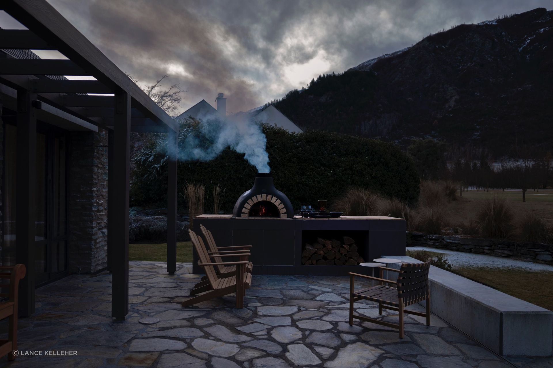 The crazy paving reflects the materiality of the area; the outdoor space was designed in conjunction with local landscapers.