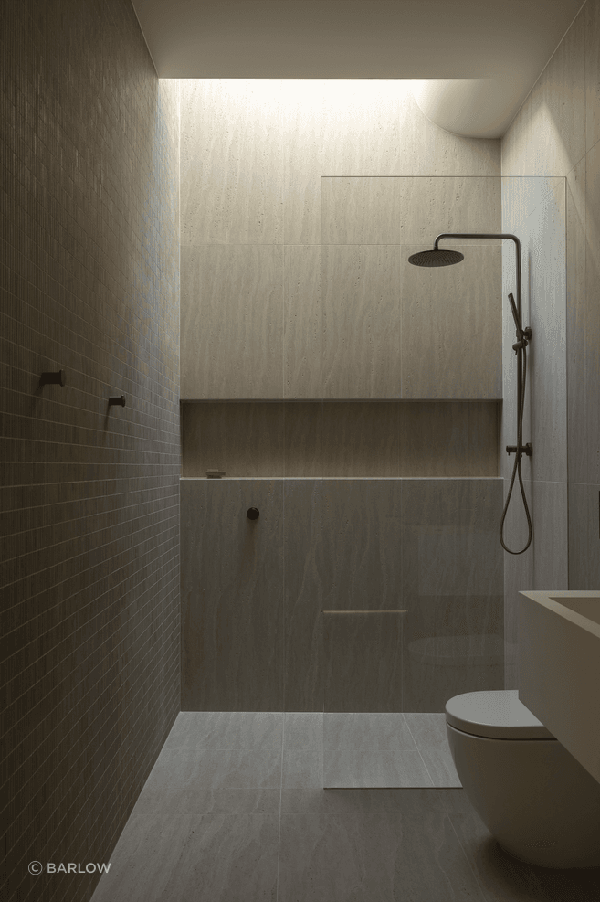 Light is welcomed in from above with the curved ceiling a reference to other parts of the home.