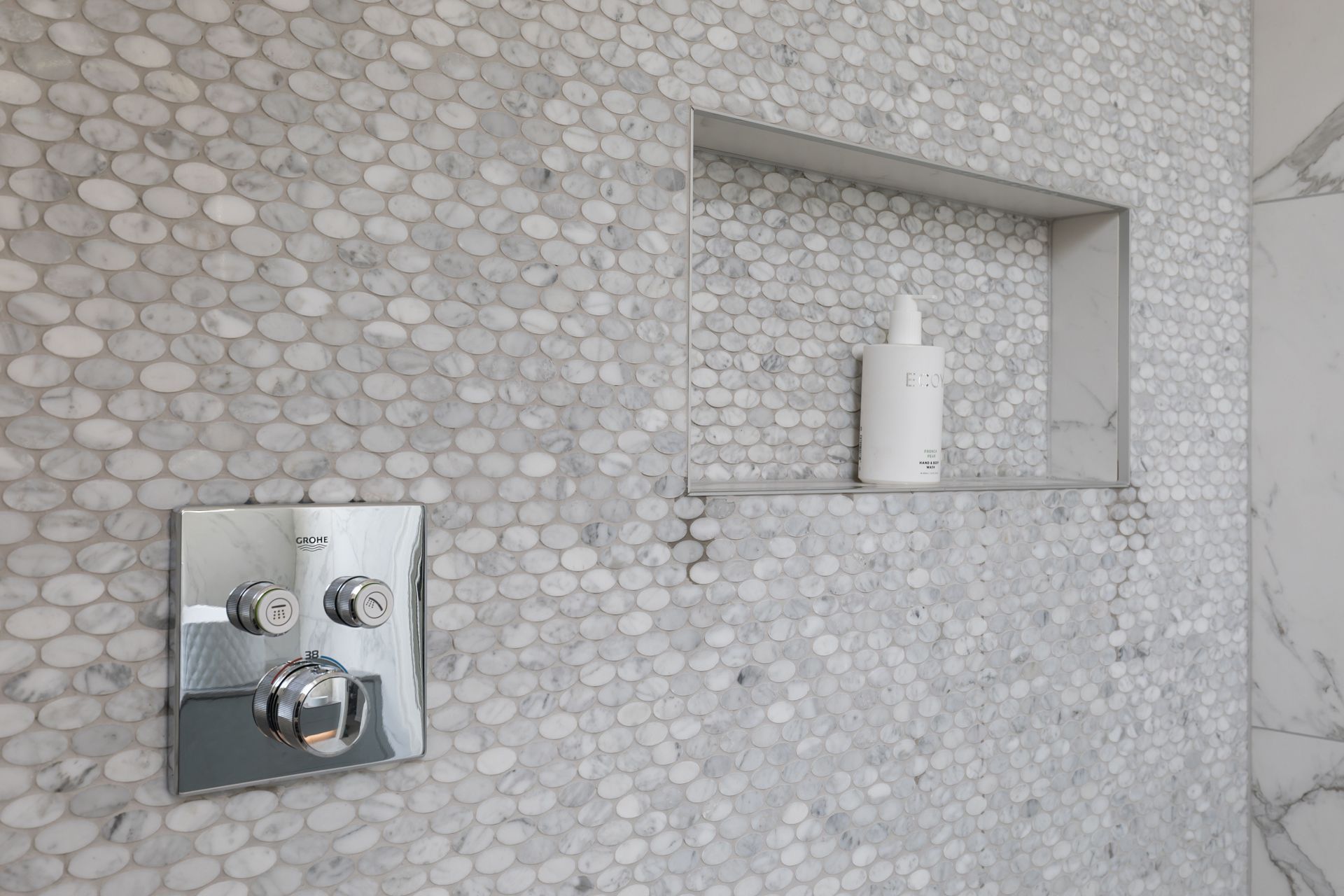 Ensuite Bathroom - adding texture and pattern through carrara marble mosaic tiles