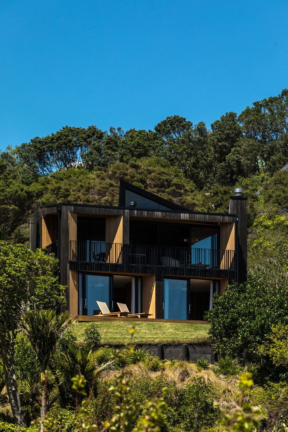 The house sits at the top of a subdivided site with neighbours on all sides yet still retains a sense of priva