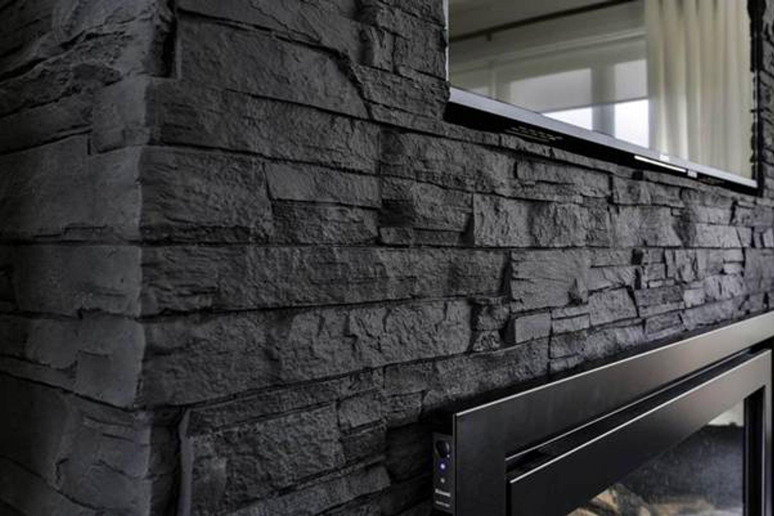 Strata Stone Wall Panels by Muros | Black Stacked Stone