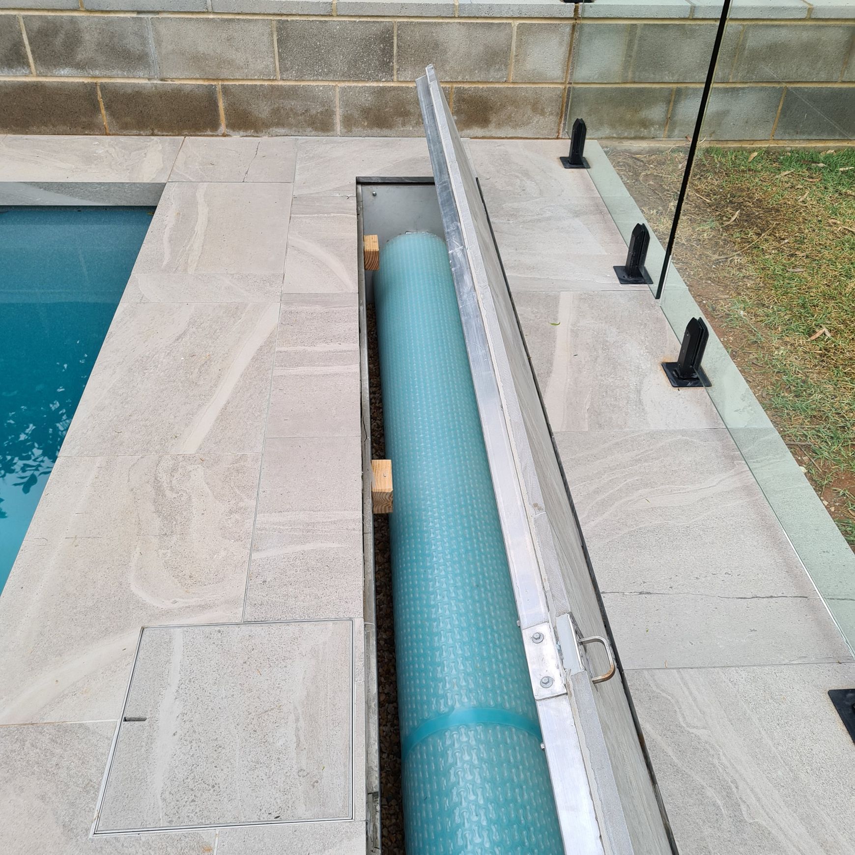 Concrete UnderCover® Concealed Pool Cover - Powered