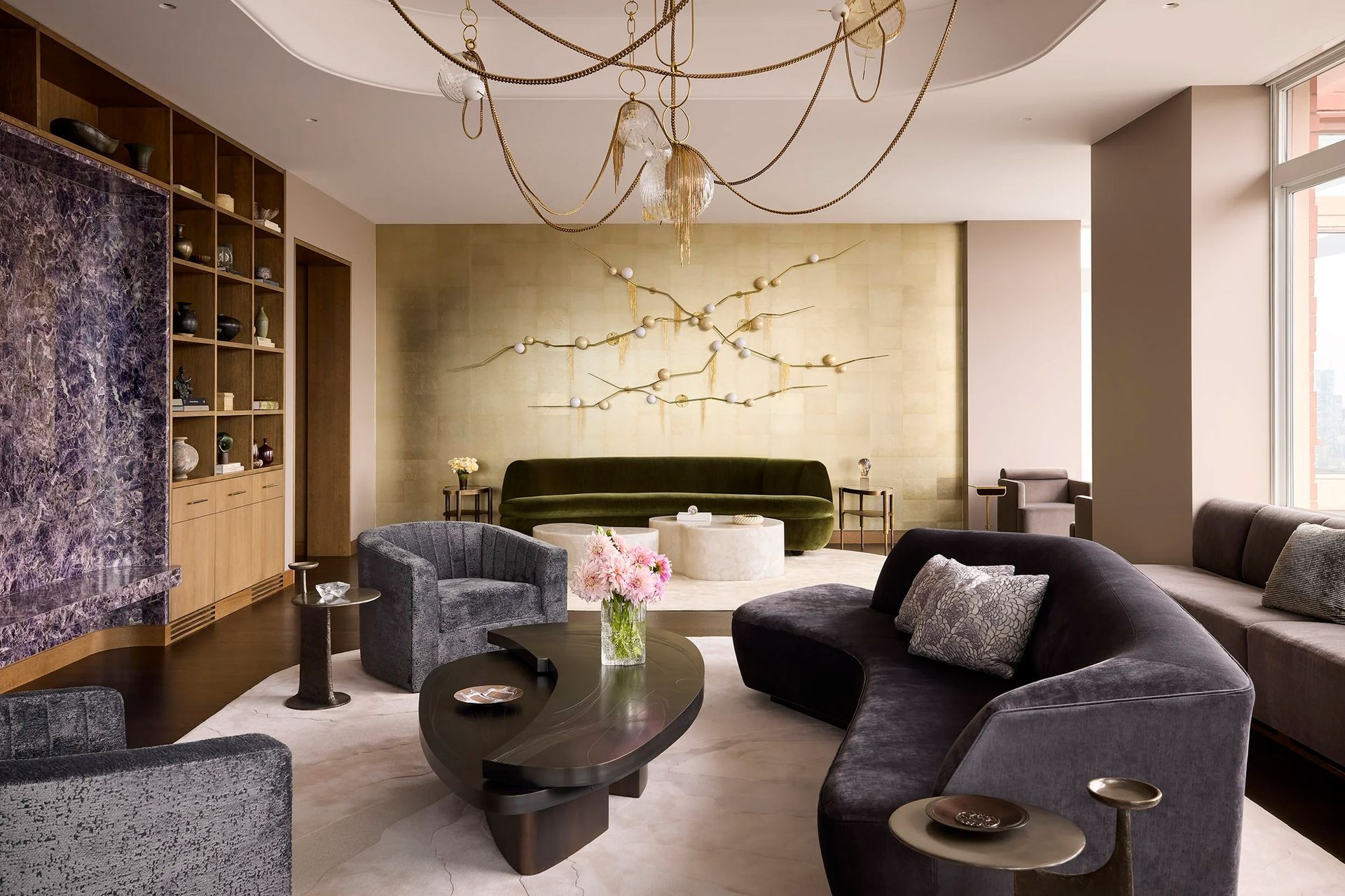 east-river-penthouse-living-room-custom-metal-glass-chandelier-brass-wall-sculpture-ap-compressed.jpg