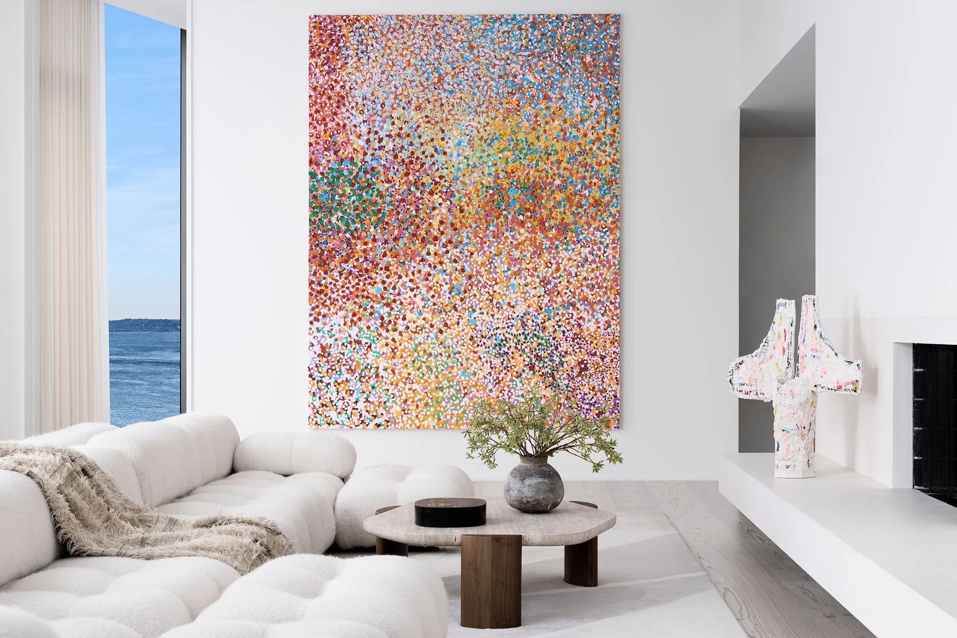 hudson-river-penthouse-living-room-colorful-art-collection-waterfront-view-ap-compressed.jpg