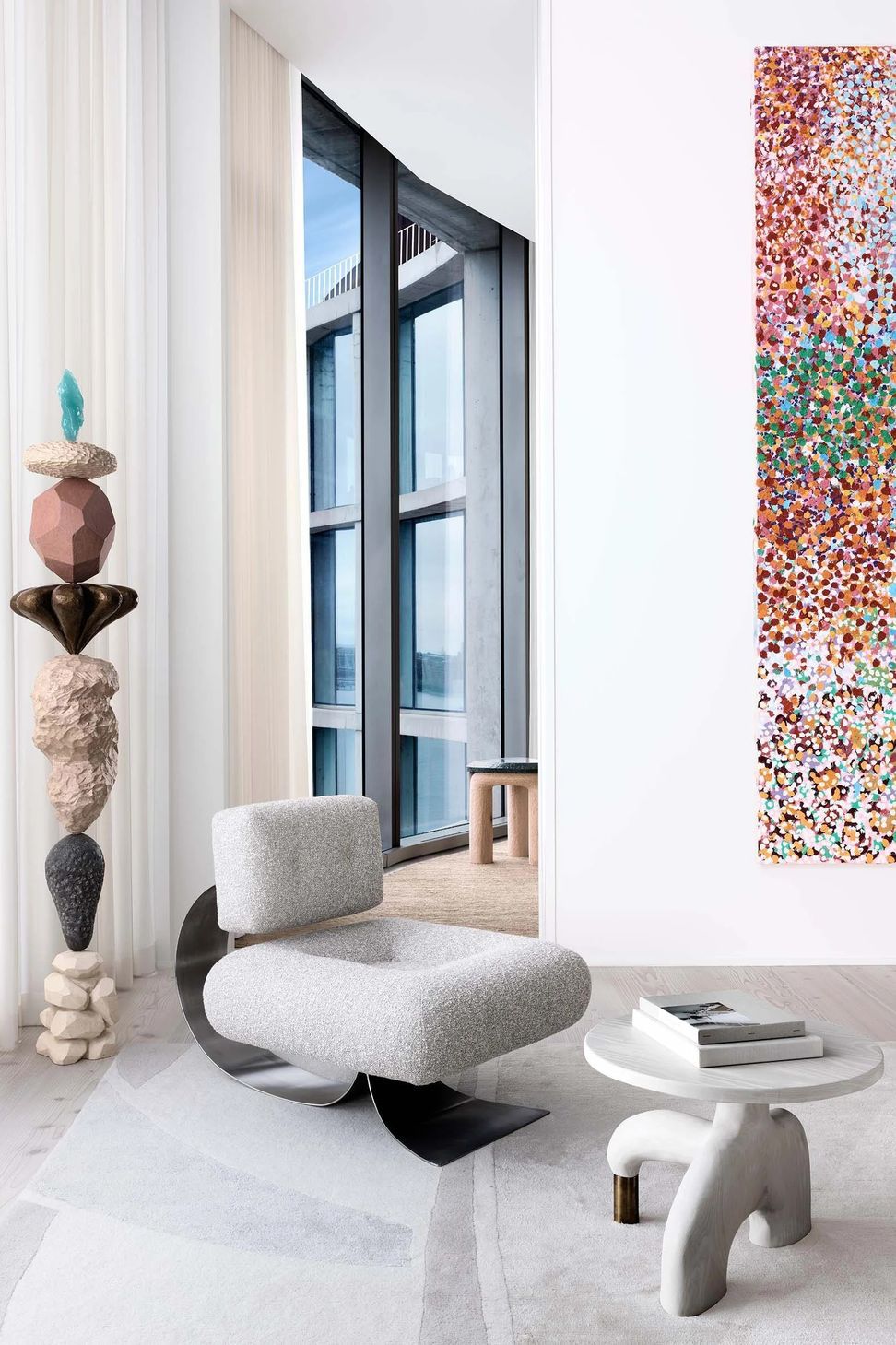 hudson-river-penthouse-sitting-area-curved-glazing-whimsical-art-collection-ap-compressed.jpg