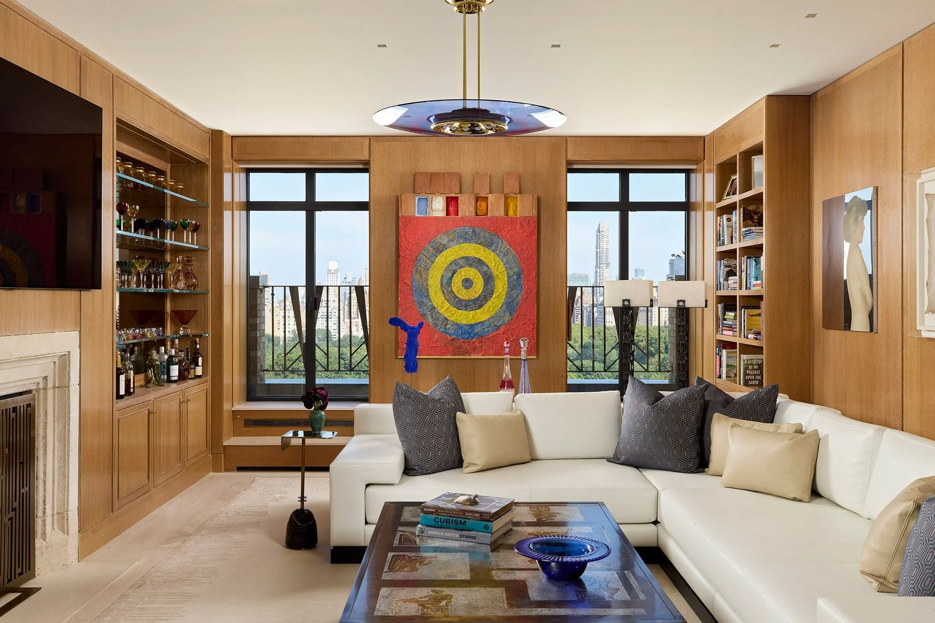 majestic-115-central-park-west-art-deco-renovation-wood-paneled-family-room-central-park-view-ap-compressed.jpg