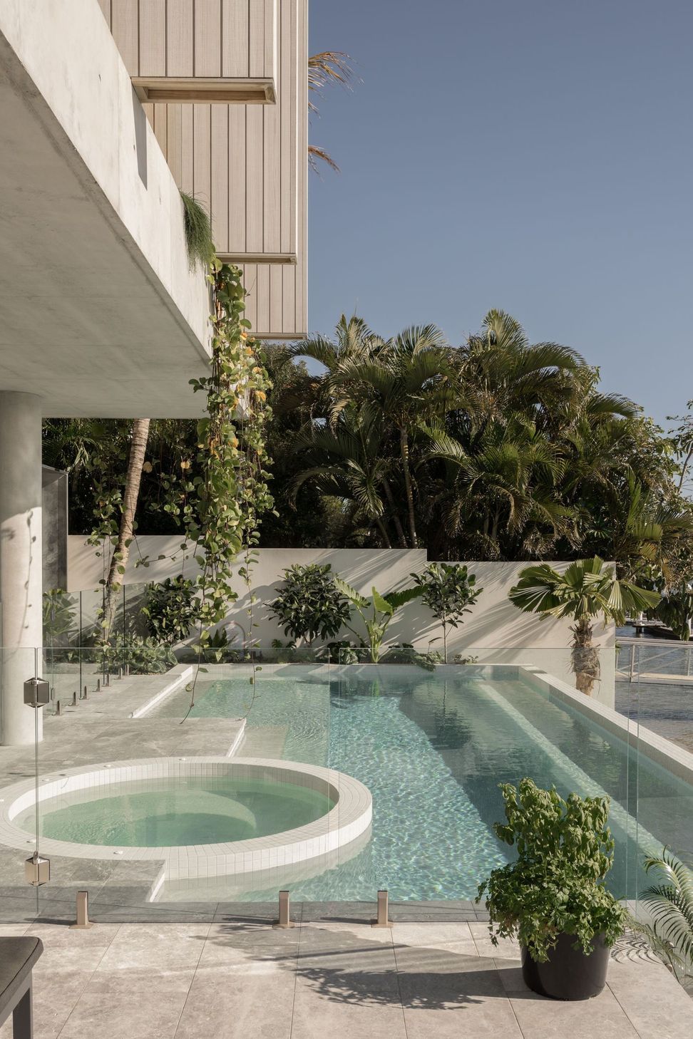 Solmere - Pool. Tiled plunge pool wrapped in tropical planting.