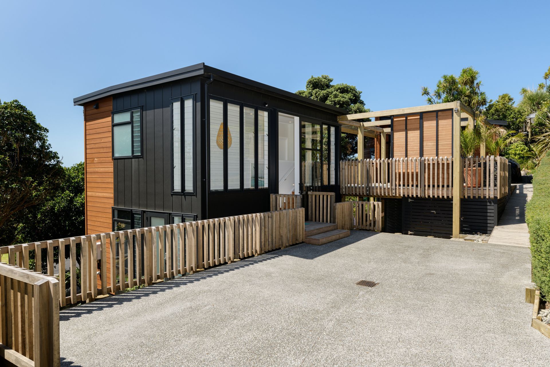 Motorcourt access and ramp to the main outdoor living deck.
