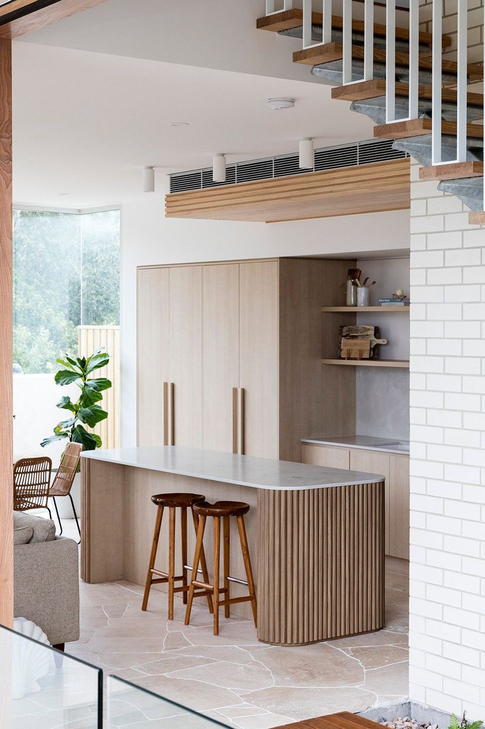 Viner Residence - Kitchen. Kitchen and storage in pale timber.